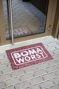 F.C. De Kampioenen - Deurmat Boma Worst